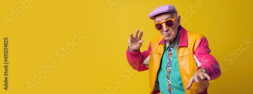 Senior man wearing 80s style colorful outfit is dancing on colored background. Generative AI photo