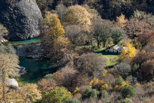 Old chapel at the springs of Voidomatis River at the Vikos Gorge, listed as the deepest gorge in the world by the Guinness Book of Records, in Epirus, Greece