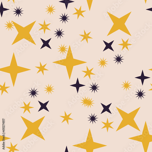 Seamless pattern with yellow and blue stars on light pink background