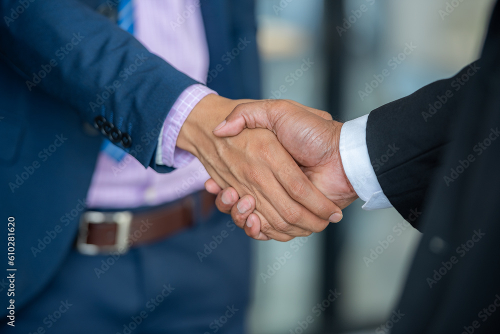 handshake after partnership meeting success business contract deal. Teamwork congratulate Handshaking for good deal contract agreement partner sign contract paper trust team. handshake after partnership meeting success business contract deal. Teamwork congratulate Handshaking for good deal contract agreement partner sign contract paper trust team.