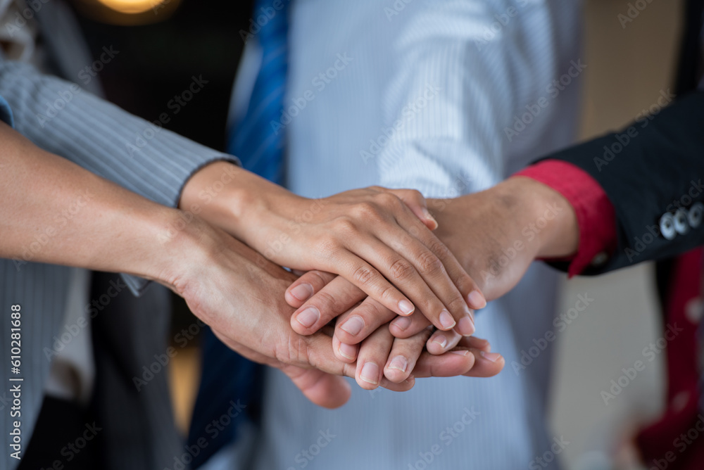 business teamwork putting join hands together. Unity and teamwork show by Stack mix of hands with Spirit diversity solidarity team Partner. Joins hands together teamwork meetings empower. business teamwork putting join hands together. Unity and teamwork show by Stack mix of hands with Spirit diversity solidarity team Partner. Joins hands together teamwork meetings empower.