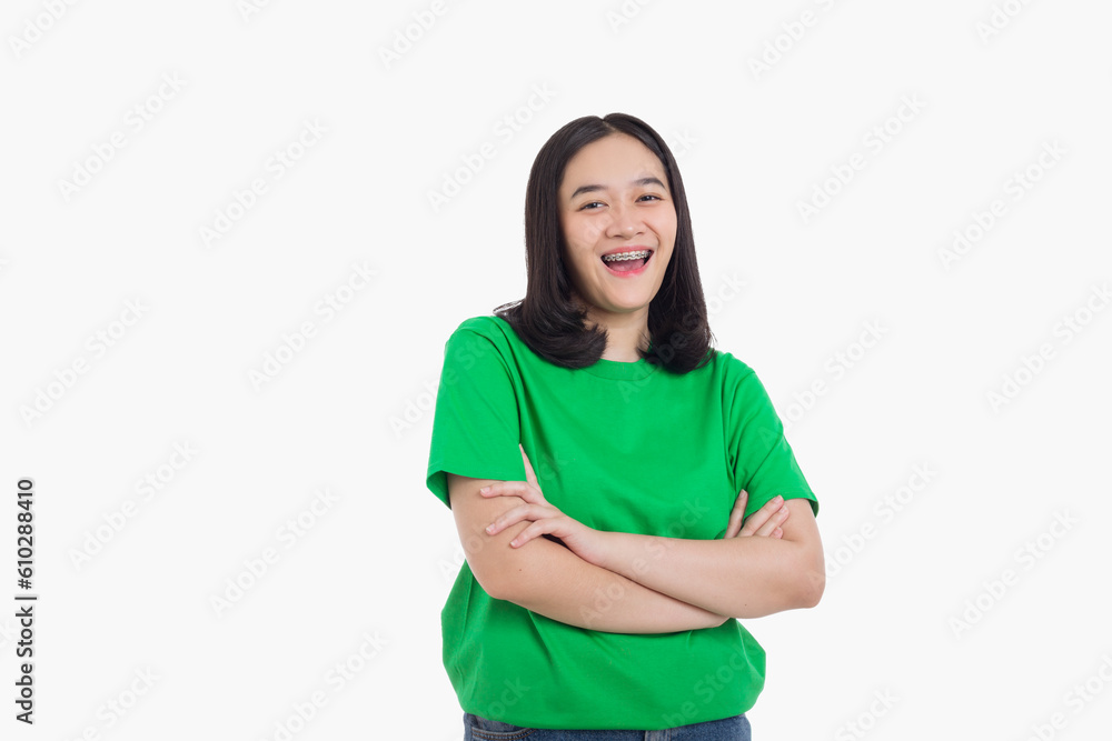smiling on isolated white background look to camera with arms crossed