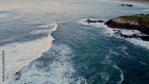 Rough With Foamy Waves On The Mediterranean Sea Near Arteixo, La Coruna, Galicia, Spain. Aerial Topdown photo