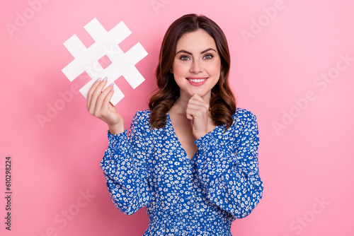 Fotografiet Portrait of adorable stunning lady wear trendy blue clothes hold hashtag card pr