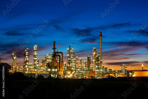 Twilight scene of tank oil refinery plant and tower column of Petrochemistry
