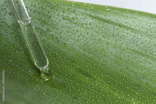 A drop of raw material flows from a medical pipette