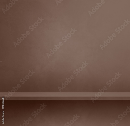 Empty shelf on a chocolate brown concrete wall. Background template. Square mockup