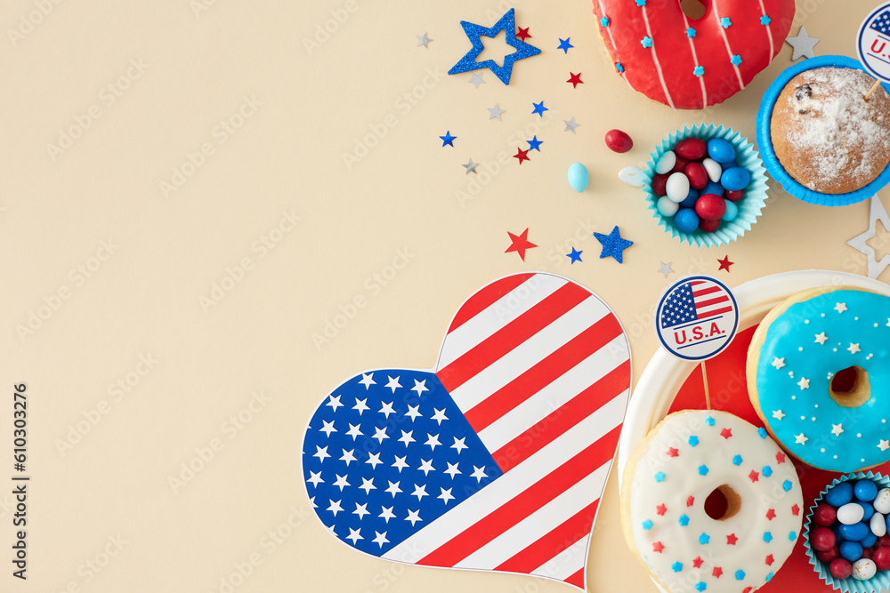 Obraz premium The concept of a sweet-centric festivity on July 4th. Top view flat lay of american flag in the shape of a heart, patriotic sweets, confetti on pastel beige background with space for ad or text