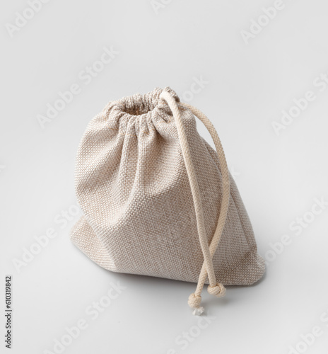 Fabric pouch with a drawstring on a white background