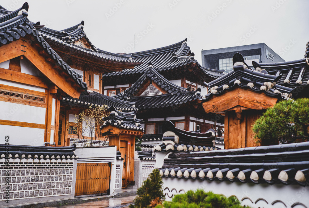 Bukchon Hanok Village in Seoul, South Korea. View of traditional wooden buildings. Bukchon Hanok Village in Seoul, South Korea. View of traditional wooden buildings.