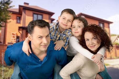 Beautiful happy young family have fun together outdoors.