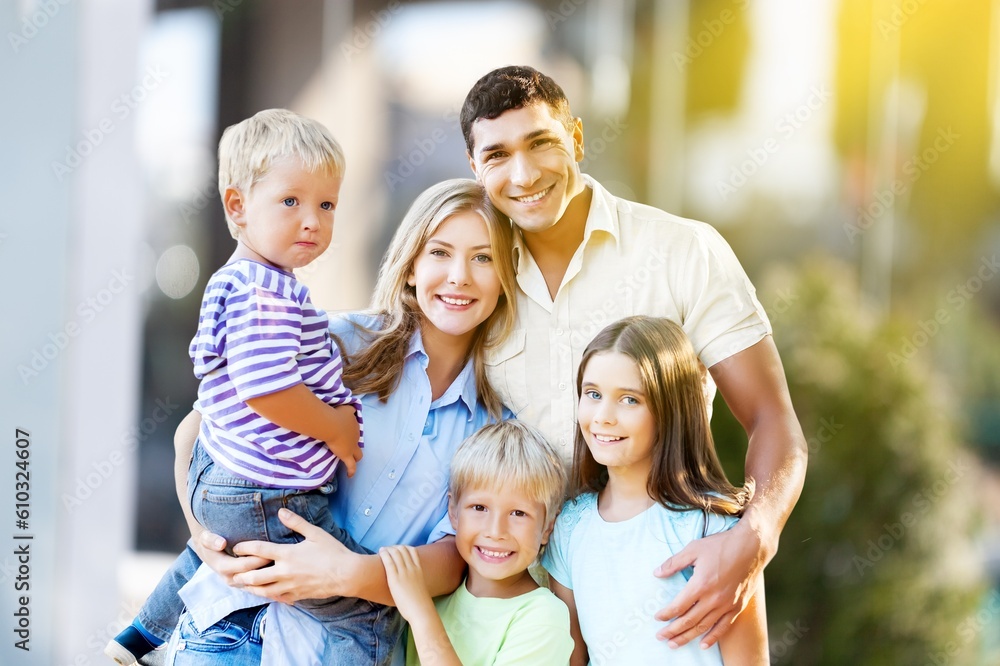 Beautiful happy young family have fun together outdoors. Beautiful happy young family have fun together outdoors.