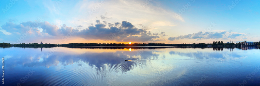 Lake in the Bos in Amstelveen near Amsterdam at sunset Lake in the Bos in Amstelveen near Amsterdam at sunset