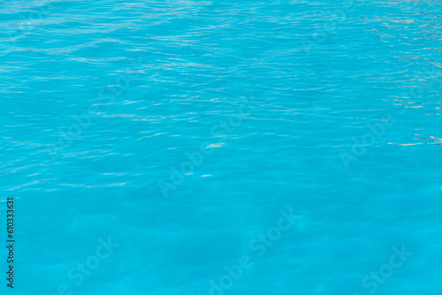 Blue clear pool water abstract reflection wave surface background clean wet © Andrey