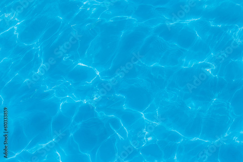 Blue clear pool water with abstract pattern of reflection and wave surface clean transparent background