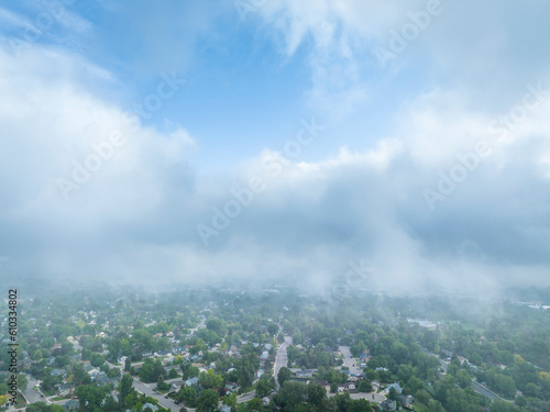 foggy and cloudy spring morning over Fort Collins, Colorado, aerial view