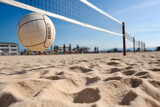 Beach volleyball lies on the sand waiting for the game to start, with a volleyball net in the background, generative AI.