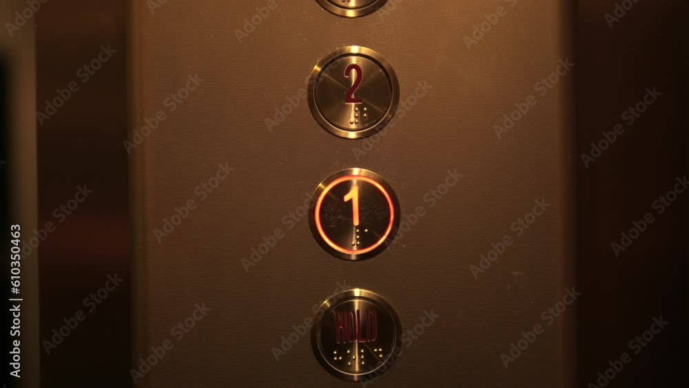 Young Woman Pressing 1 Floor Elevator Button in Hotel or Office Building 4K Close Up Footage. Young Woman Pressing 1 Floor Elevator Button in Hotel or Office Building 4K Close Up Footage.