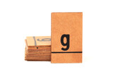 Stack of letters from a very old letterbox used to teach children - Letter g