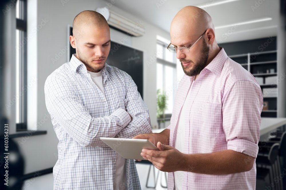 Two managers discussing big business project Two managers discussing big business project