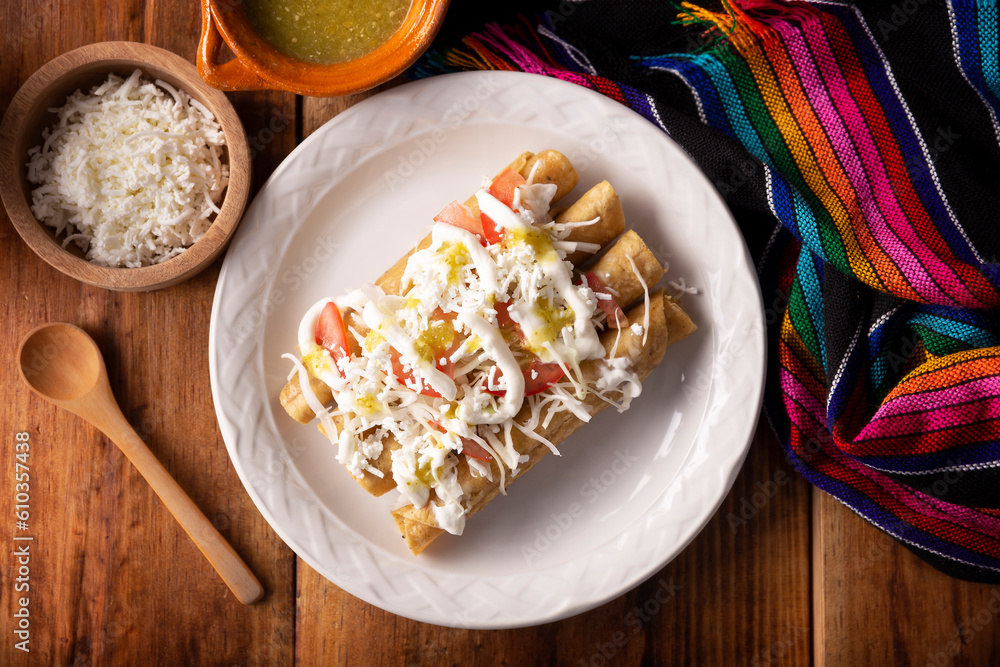 Tacos Dorados. Mexican dish also known as Flautas, consists of a rolled