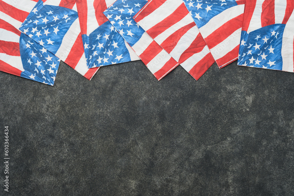 Obraz premium 4th of July background. USA paper fans, Red, blue, white stars, balloons, gold confetti on gray dark concrete background. Happy Labor, Independence or Presidents Day. American flag colors. Top view.
