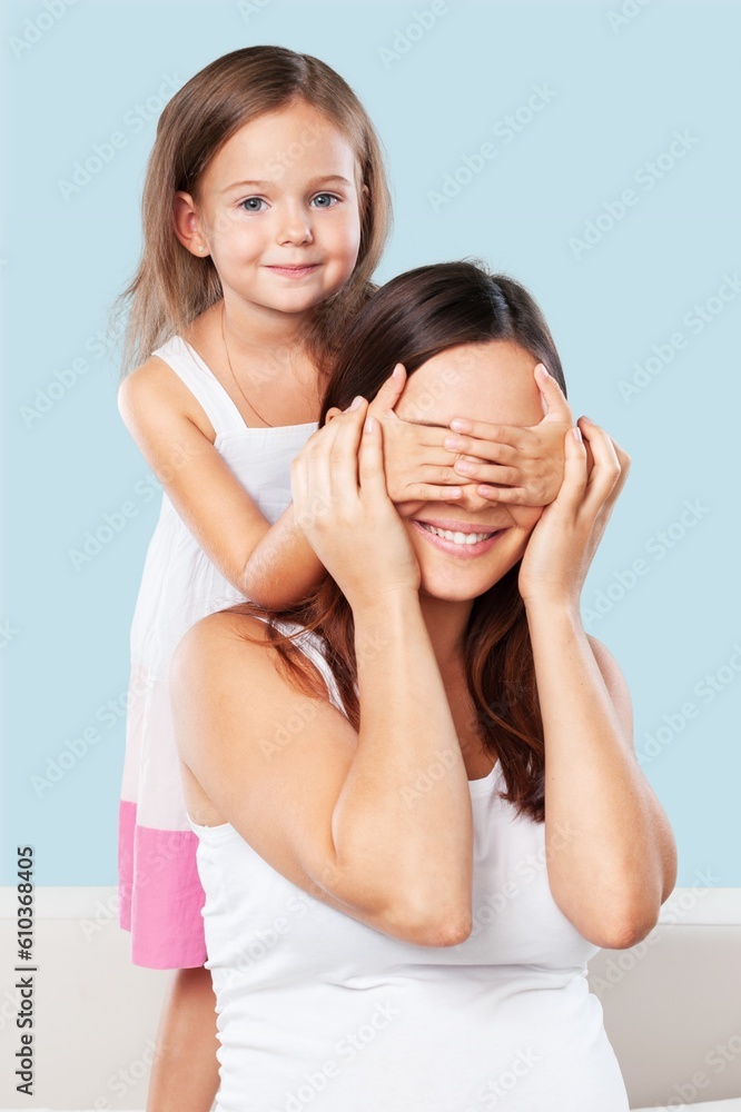 Fun parent mom with daughter close eyes Fun parent mom with daughter close eyes