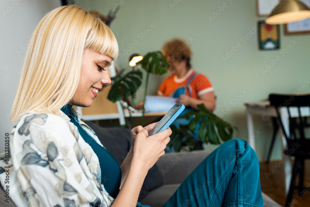 Portrait of a smiling lesbian couple spending time together at home. Portrait of a smiling lesbian couple spending time together at home.