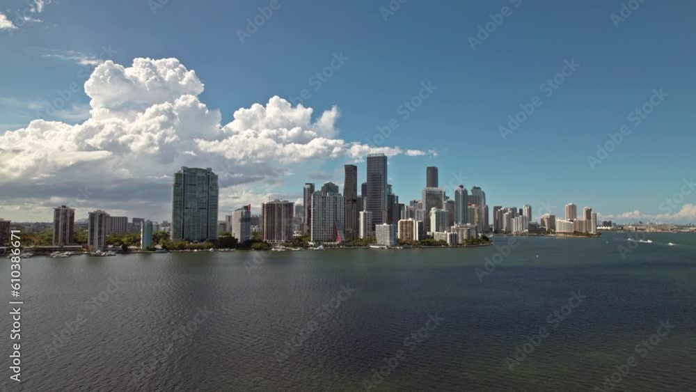 Beautiful establishingaerial drone shot of Brickell area in Miami Florida. Drone moves forward towords skyscrapers. Sunny day. Beautiful and clear sky with a little clouds Beautiful establishingaerial drone shot of Brickell area in Miami Florida. Drone moves forward towords skyscrapers. Sunny day. Beautiful and clear sky with a little clouds