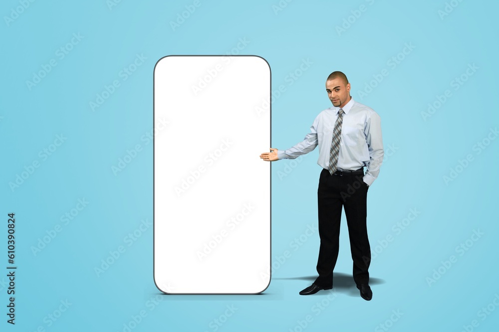 Successful young Businessman and Big Smartphone Successful young Businessman and Big Smartphone