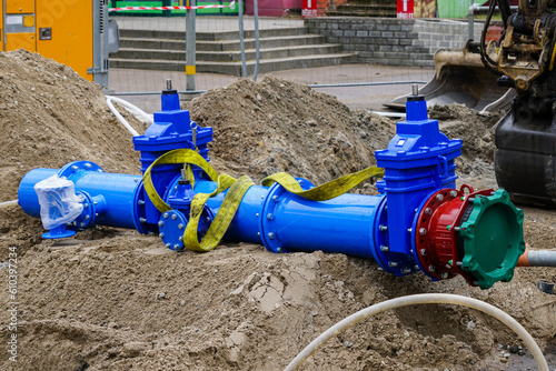 New 300mm city main drink water pipeline with gate valves before connecting to underground system