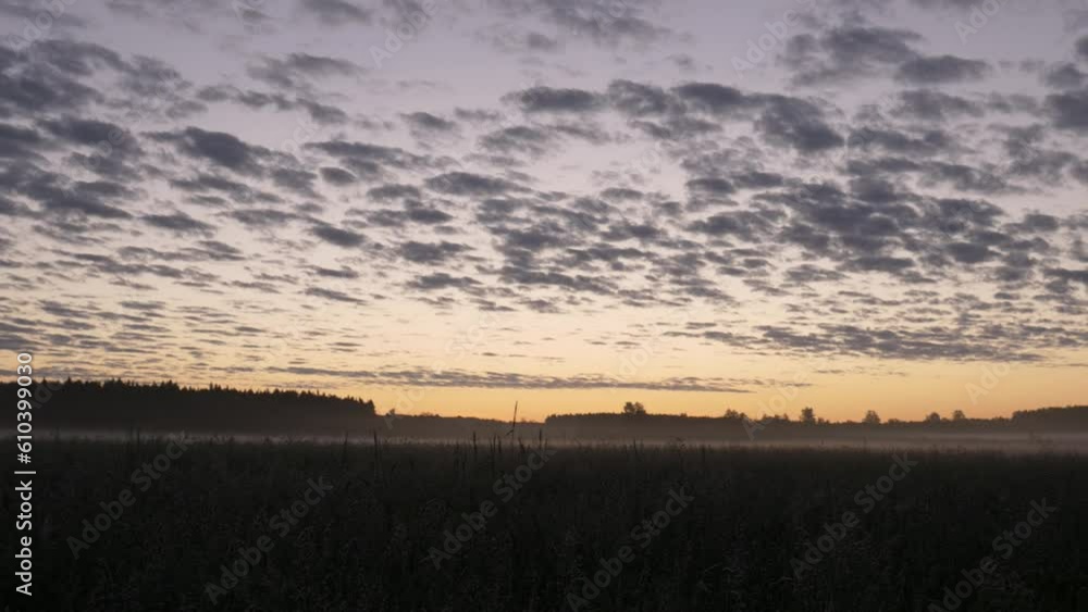 Beautiful panoramic sunrise with many small clouds. Beautiful panoramic sunrise with many small clouds.
