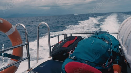 Wallpaper Mural Suitcases and backpacks are stacked on top of each other on a white beautiful boat floating between islands in the ocean. The moment of a sea cruise and the transportation of luggage on a small ferry. Torontodigital.ca