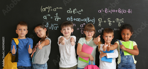 Cute students showing thumb...