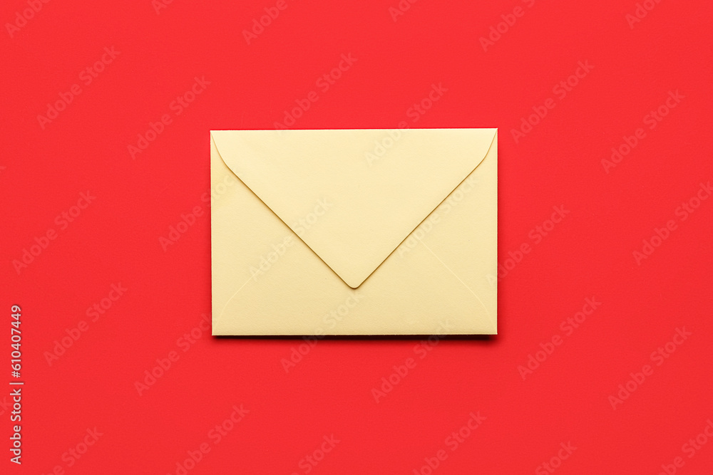 Yellow envelope on red background. Message concept Yellow envelope on red background. Message concept