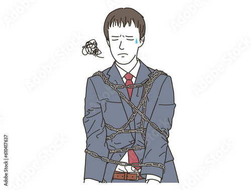 鎖で拘束をされながら悩むビジネスマン
