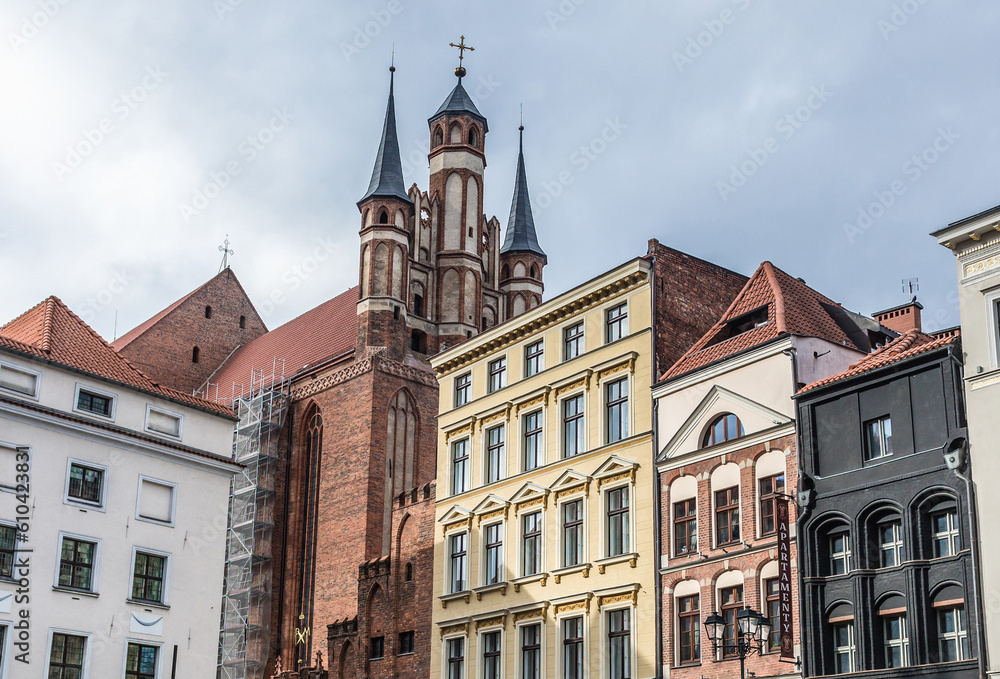 Assumption Church and buildings on main square of historic part of Torun, Poland