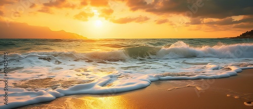 Beauty of sea nature of Mediterranean coast on warm summer evening. Setting sun illuminates stormy waves with caps of foam rolling onto golden sandy beach