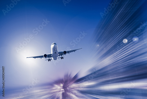 Airplane flying with dynamic colorful motion blur abstract background © JackF