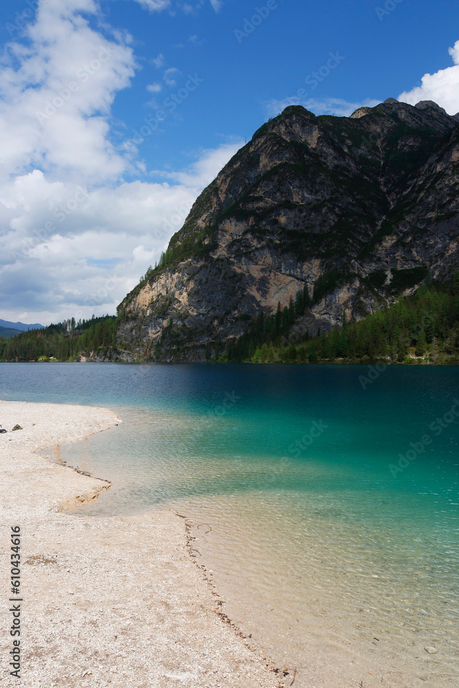 Landscape view of the emerald smooth surface of Lago di Braies in the Dolomites, northern Italy, Europe