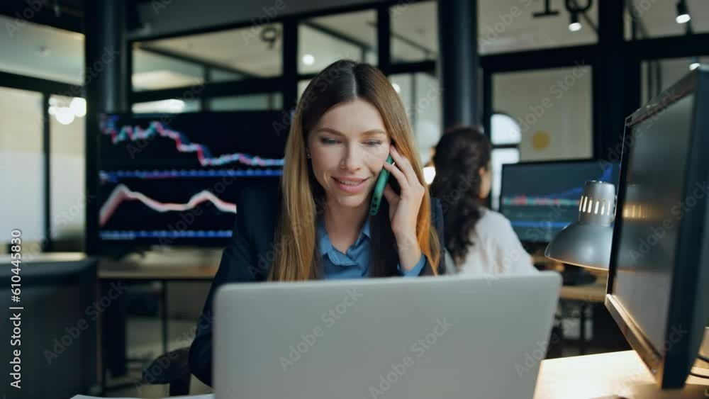 Corporate woman talk mobile phone in invest office. Sales manager consult client Corporate woman talk mobile phone in invest office. Sales manager consult client