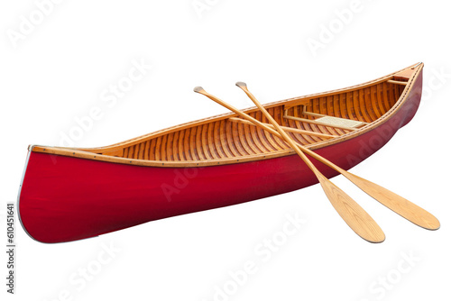 Red wooden canoe with paddles isolated on a white background photo