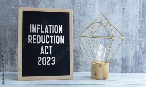 inscription Inflation Reduction Act 2023. By signing this law, people will feel safer both financially and stable. photo