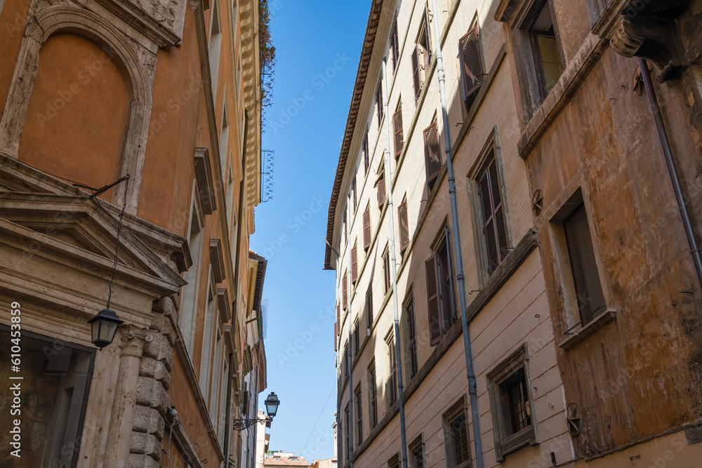 Cosy narrow street architecture in Rome. Italy