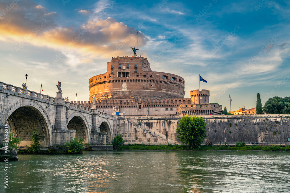Saint Angel Castle and bridge seen from Tiber river canal in Rome. Italy