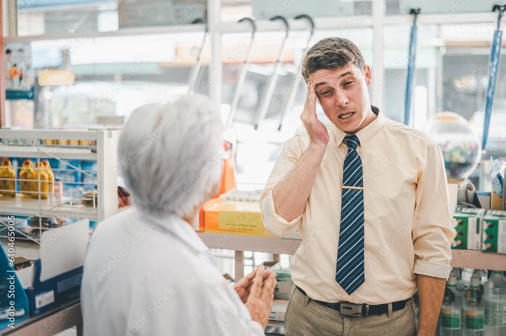 pharmacist is asking about a patient's condition in order to prescribe medication according to the patient's symptoms who come for prescription consultation in a modern pharmacy. pharmacist is asking about a patient's condition in order to prescribe medication according to the patient's symptoms who come for prescription consultation in a modern pharmacy.