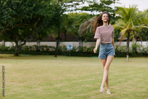 beautiful woman nature summer t-shirt grass walk lifestyle smiling park freedom © SHOTPRIME STUDIO