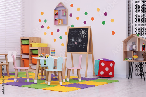 Stylish kindergarten interior with toys and modern furniture © New Africa