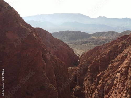 Orange Majesty: Aerial Splendor of Uquía's Enchanting Mountain Range photo