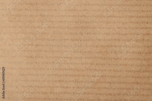 Texture of beige paper sheet as background, top view